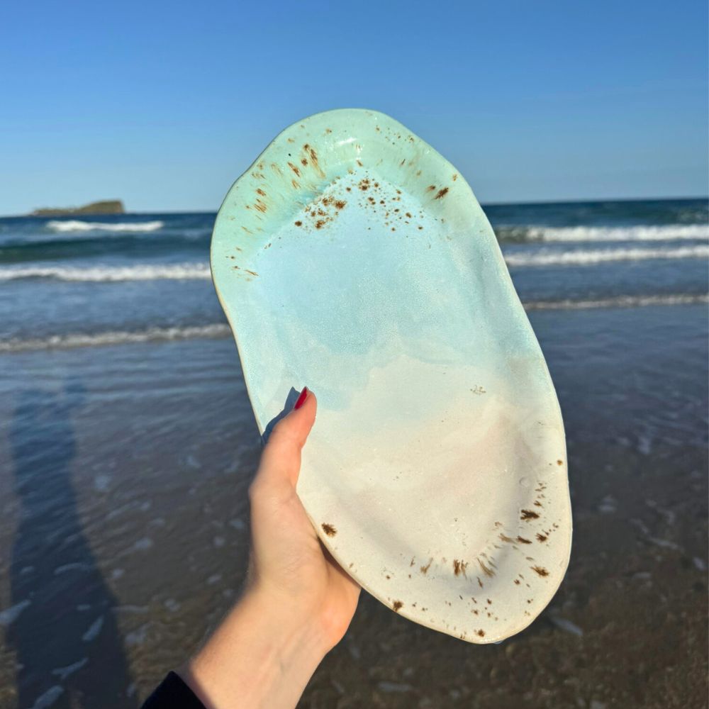 blue ocean glazed platter at beach